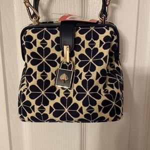Brand new Kate Spade with tags and dust bag